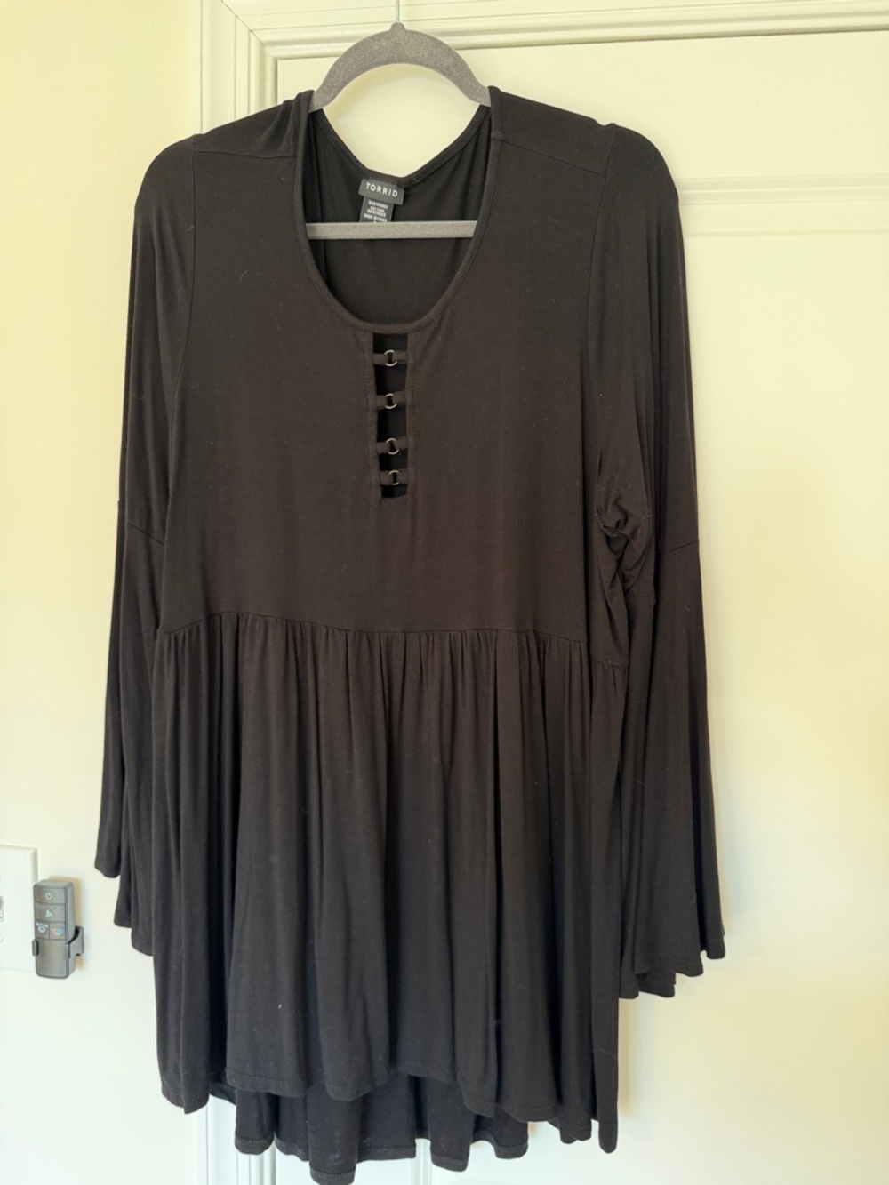 Torrid Black Long-Sleeve Swing Tunic with Front Ring Detail